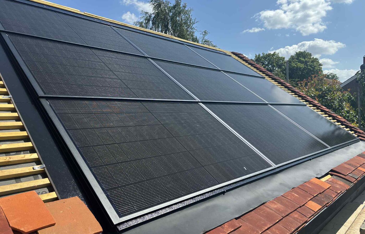All-black array on a re-tiled pitched roof